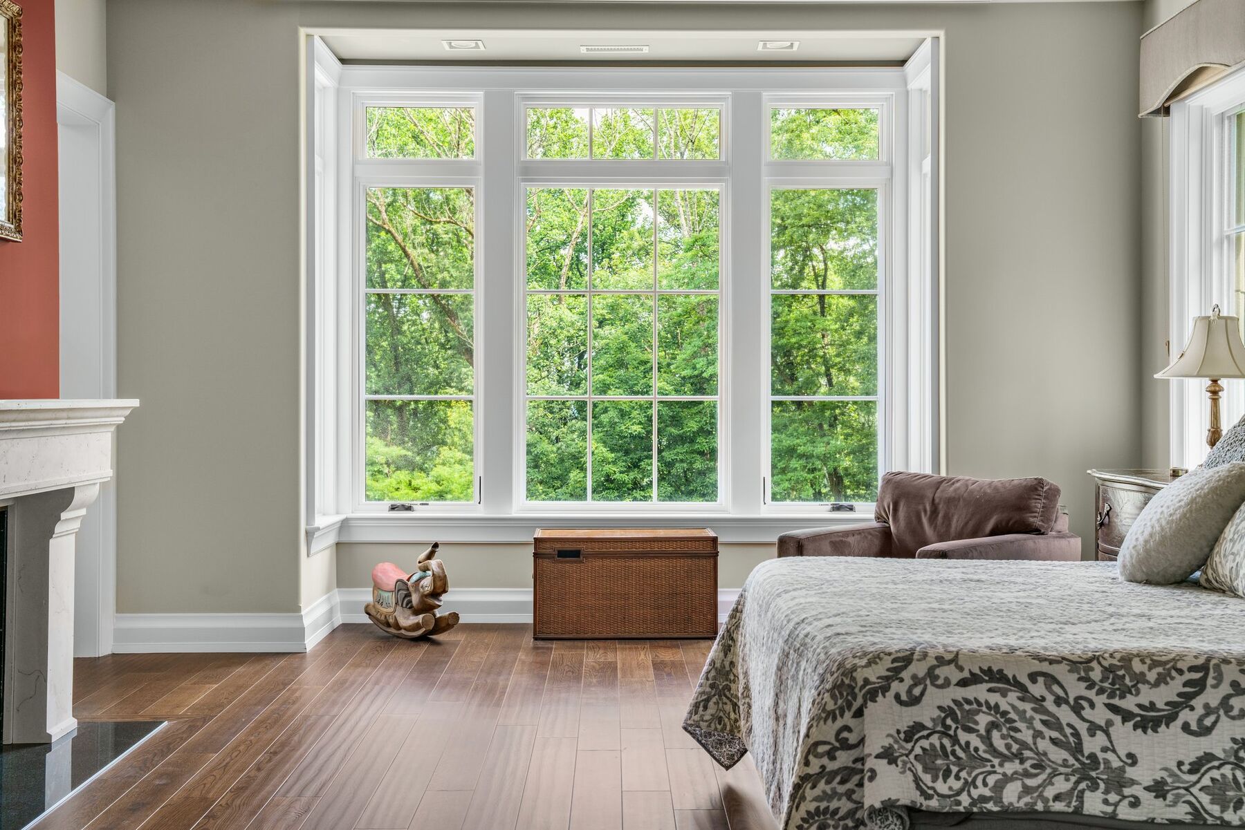 main-level primary bedroom suite at The Somerset